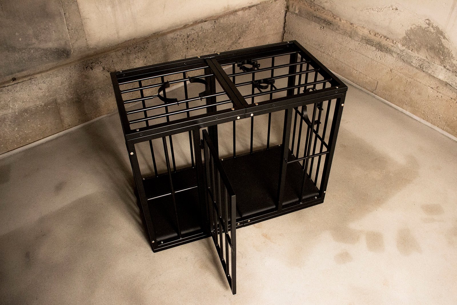 cage with cuffs