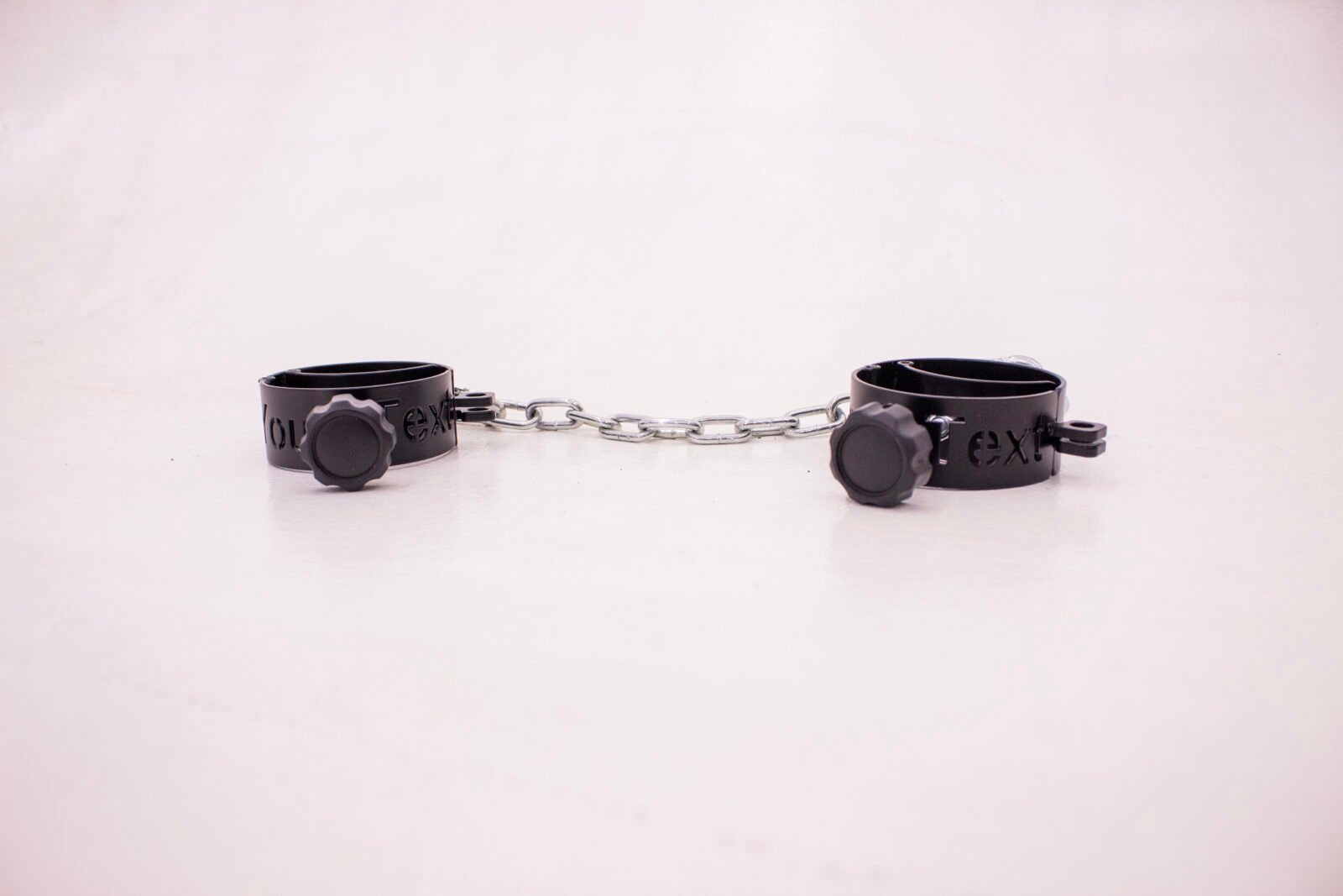 metal cuffs with text