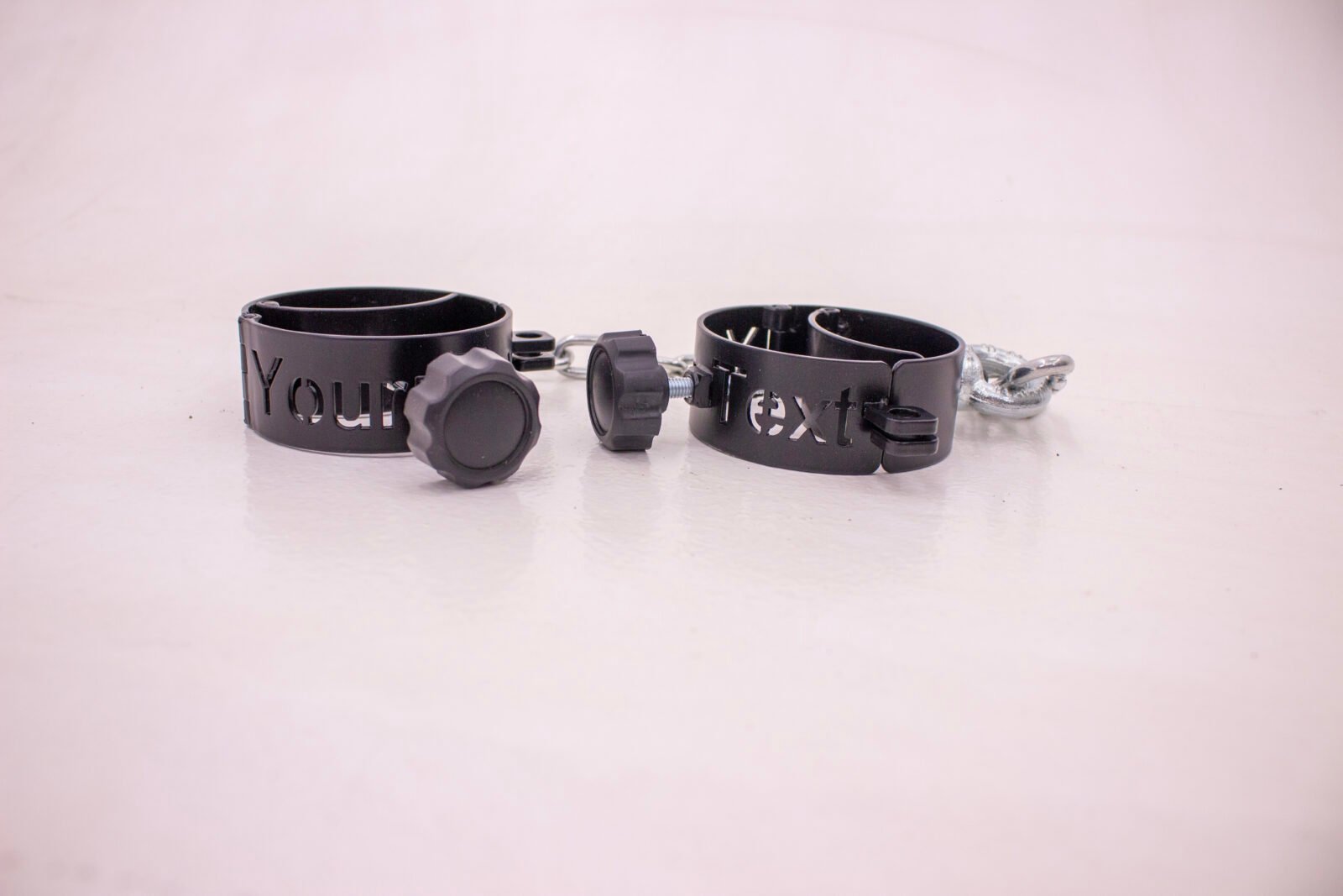 metal cuffs with text