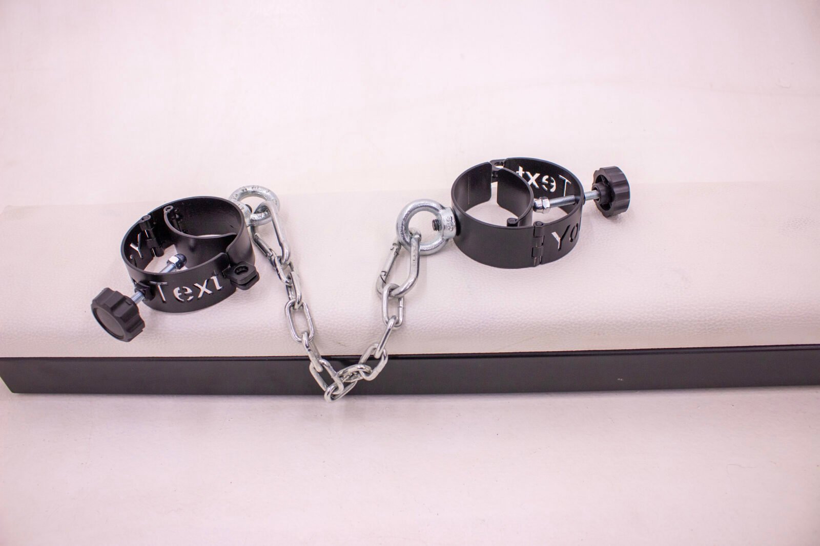 metal cuffs with text